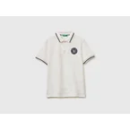 Gestreiftes Poloshirt mit Aufnäher